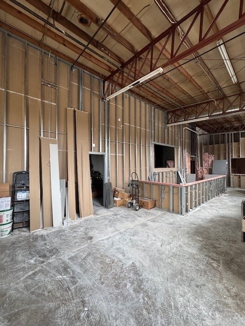 Bare metal framing and unfinished walls during the lounge construction